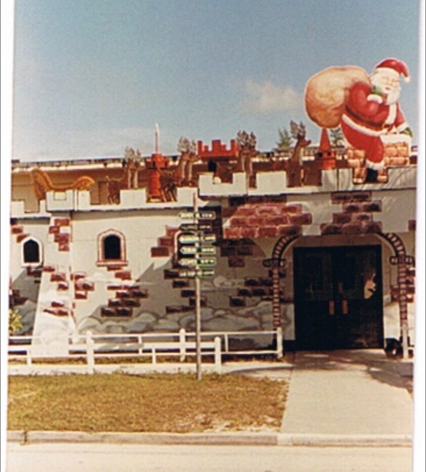 Building at Diego Garcia decorated with an oversized Santa Claus for Christmas