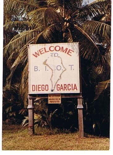 Welcome to BIOT Diego Garcia sign among palm trees